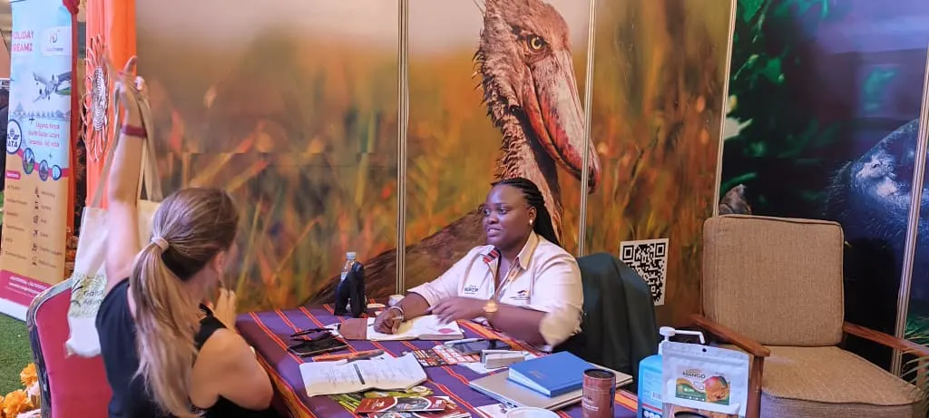 The Ameera Africa Safaris team advising a traveller at a travel expo