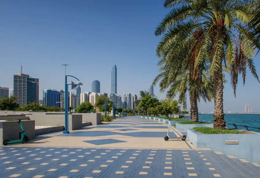 Corniche promenade palms skyline