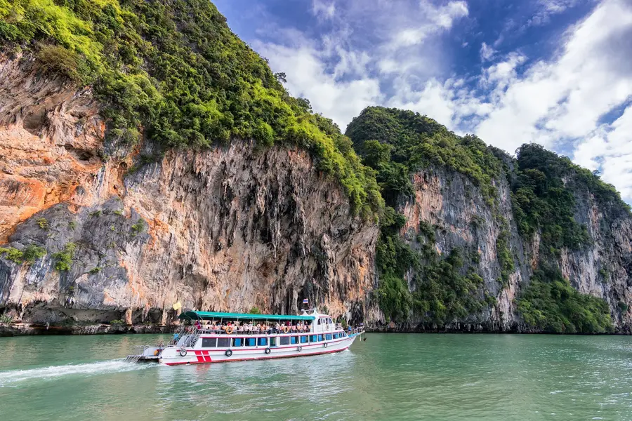 Phang nga bay boat limestone cliffs