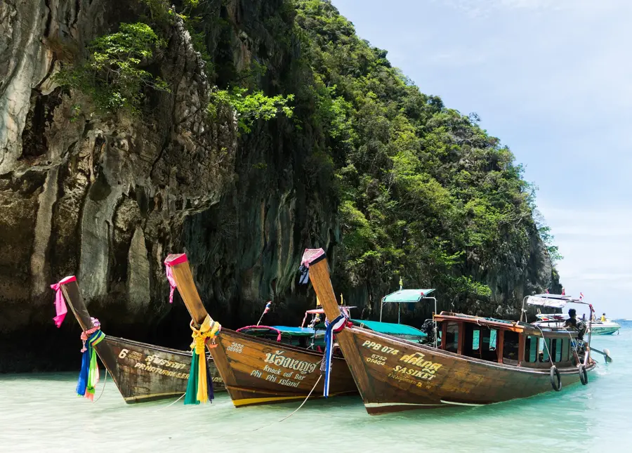 Phi phi longtail boats turquoise lagoon